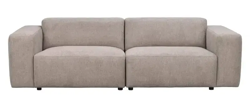Beige modulsofa i to deler med brede, kantete armlener og lave svarte føtter